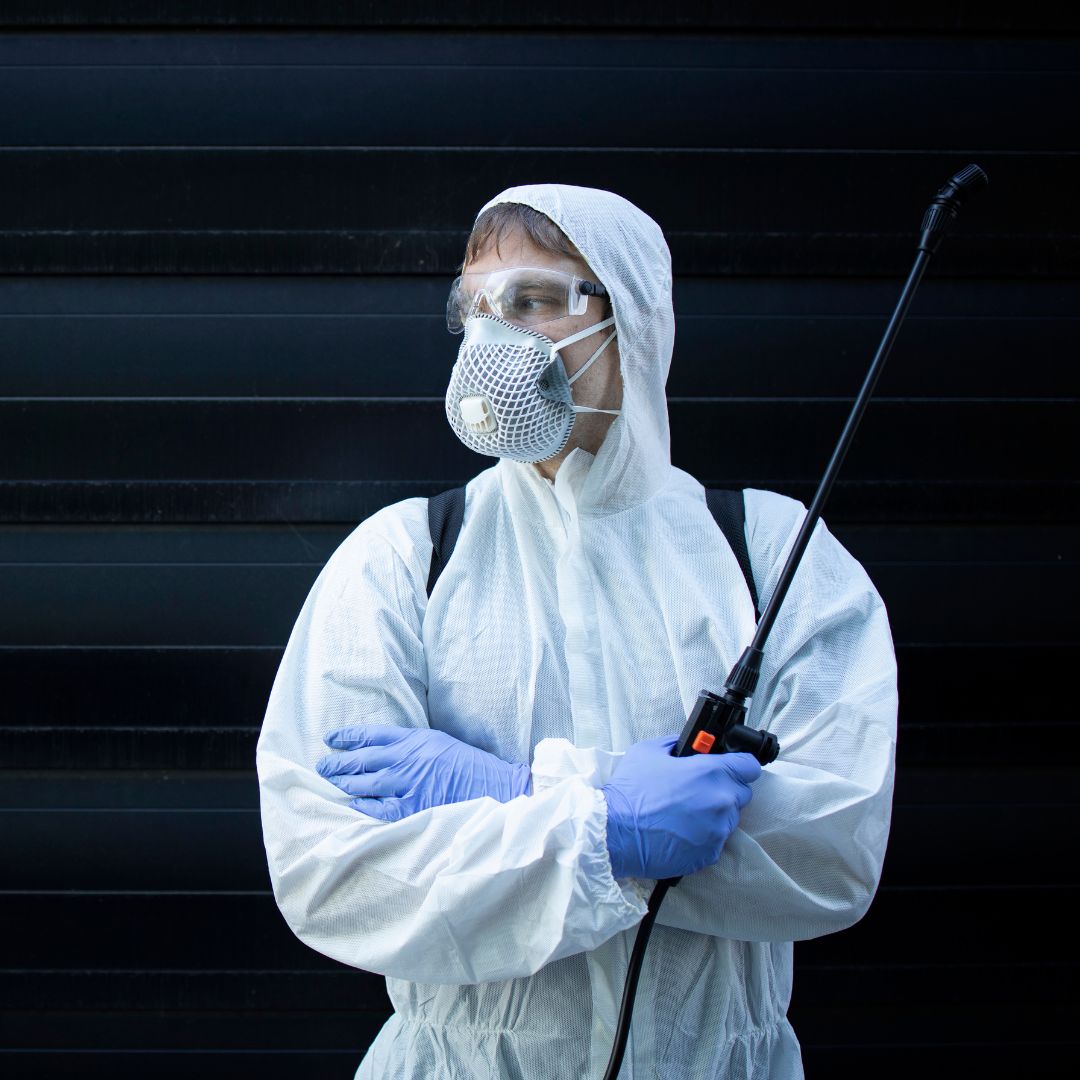 exterminator in safety gear