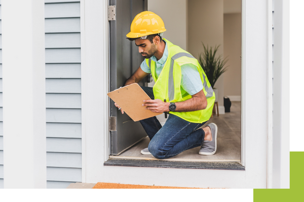 a man inspecting a home